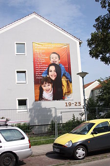 Banner an der Hausfassade Amsterdammer Str./Ecke Utrechter Str